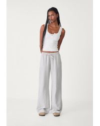 Stradivarius - Pantaloni Morbidi Misto Lino A Righe - Lyst