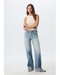 Stradivarius - D91 Jeans A Vita Bassa A Gamba Larga - Lyst