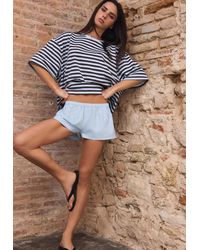 Stradivarius - Mini Short Con Bottoni - Lyst