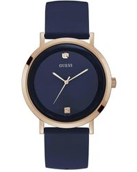 Guess - Orologio con cinturino in silicone blu e cassa in acciaio color oro rosa - Lyst