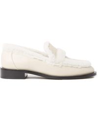 MOCASINES Y ZAPATOS PLANOS sandalias y chanclas de Mocasines PALMER CHILL Mujer Zapatos de Zapatos planos de Stuart Weitzman de color Blanco 