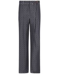 Prada - Pantalone in seta stampata - Lyst