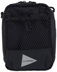and wander - 'Ecopack' Crossbody Pouch Bag - Lyst