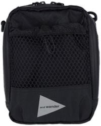 and wander - 'Ecopack' Crossbody Pouch Bag - Lyst