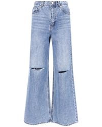 DUNST - Flared Destroyed Jeans - Lyst