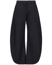 Alaïa - Trousers "Petal" - Lyst