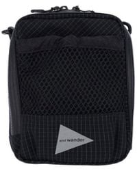 and wander - 'Reflective' Crossbody Pouch Bag - Lyst