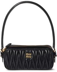 Miu Miu - Pouch in nappa matelassÉ - Lyst