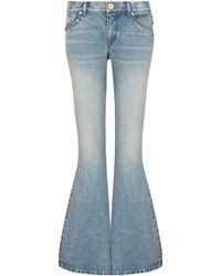 Balmain - Flared jeans - Lyst