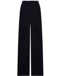 Saint Laurent - Pantaloni a gamba ampia in chinÉ di lana - Lyst