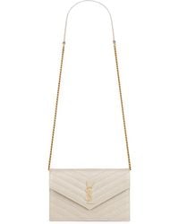 Saint Laurent - Pochette envelope con catena cassandre classica in pelle grain de poudre - Lyst