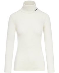 Jil Sander - Top a maniche lunghe con scollo a imbuto - Lyst