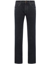 Saint Laurent - Jeans slim fit in denim nero scuro - Lyst