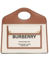 Shop Burberry Black Micro Two-tone Pocket Bag in Canvas & Leather for WOMEN, Ounass UAE