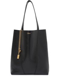 Chloé - Tote bag chloÉ spin in pelle granata - Lyst