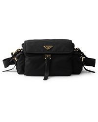 Prada - Borsa explore medium in re-nylon con pattina - Lyst