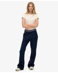 Superdry - & Co Athletic Essentials Logo Low Rise Flare jogger - Lyst