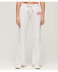 Superdry - Ladies Classic Embroidered Neon Vintage Logo Low Rise Flare joggers - Lyst