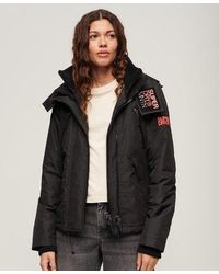 Superdry - Ladies Classic Embroidered Hooded Mountain Windbreaker Jacket - Lyst