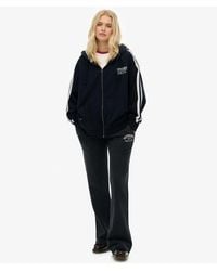 Superdry - & Co Athletic Embroidered Flare joggers - Lyst