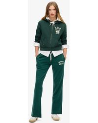 Superdry - Embroidered Athletic Essentials Low Rise Flare joggers - Lyst
