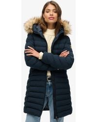 Superdry - Doudoune mi-longue à capuche en fourrure synthétique - Lyst