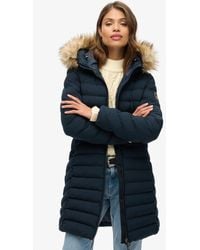 Superdry - Slim Fit Logo Patch Fuji Faux Fur Hood Mid Length Puffer Coat - Lyst