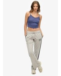 Superdry - & Co Athletic Essentials Stripe Flare joggers - Lyst