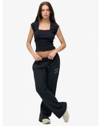 Superdry - & Co Athletic Print Flare joggers - Lyst