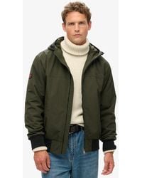 Superdry - Classic Embroidered Logo Surplus Nylon Hooded Bomber Jacket - Lyst