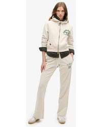 Superdry - & Co Athletic Essentials Low Rise Flare joggers - Lyst