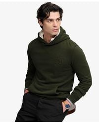 Superdry - Company Logo Embossed Hoodie - Lyst