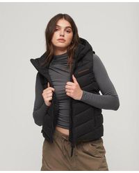 Superdry - Lightweight Embroidered Hooded Microfibre Padded Gilet - Lyst