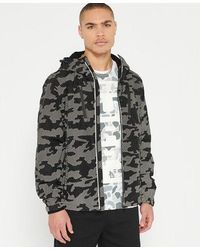 Superdry Synthetic Sport Tech Cagoule Reflective Jacket in Black/Grey  (Black) for Men - Lyst