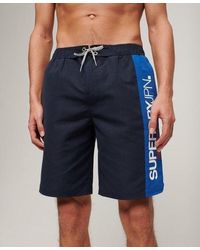 Superdry - Short de surf recyclé 48 cm à logo sportswear - Lyst