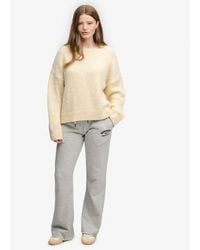 Superdry - & Co Athletic Embroidered Flare joggers - Lyst