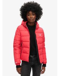 Superdry - Ladies Embroidered Hooded Spirit Sports Puffer Jacket - Lyst