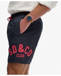 Superdry - & Co Printed Logo 16-inch Swim Shorts - Lyst