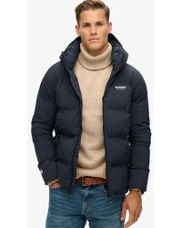 Superdry - Wijdvallende Pufferjas Met Capuchon - Lyst