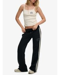 Superdry - Athletic Essentials Stripe Flare joggingbroek - Lyst