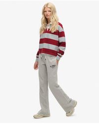 Superdry - & Co Athletic Embroidered Flare joggers - Lyst
