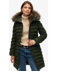 Superdry - Doudoune mi-longue à capuche en fourrure synthétique - Lyst