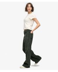 Superdry - & Co Mid Rise baggy Jumbo Cord Pants - Lyst