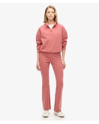 Superdry - Sport Tech Low Rise Flared joggers - Lyst