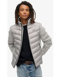 Superdry - Gebreide Hybrid Storm Jas Met Wattering - Lyst