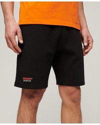 Superdry - Sport Tech Logo Tapered Shorts - Lyst