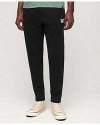 Superdry - Pantalon de survêtement fuselé à logo sportswear - Lyst