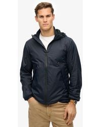 Superdry - & Co Hooded Logo Windbreaker Jacket - Lyst