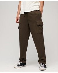 Superdry - Relaxed Cargo joggers - Lyst