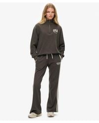 Superdry - & Co Athletic Stripe Flare joggers - Lyst